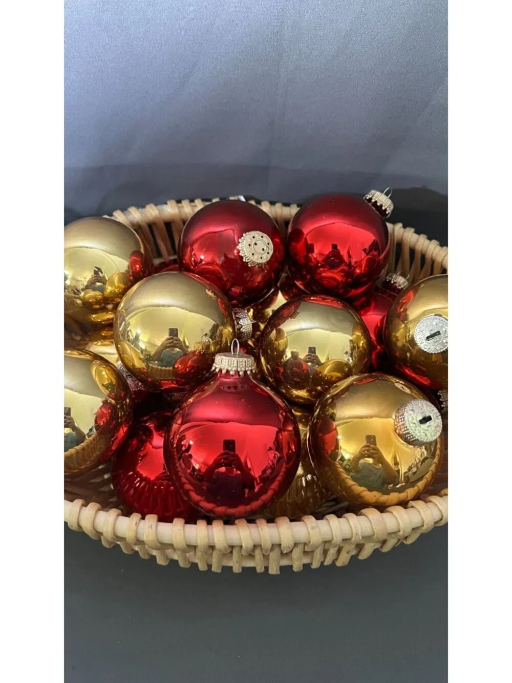Shiny Red & Gold Christmas Ornaments In Wicker Basket